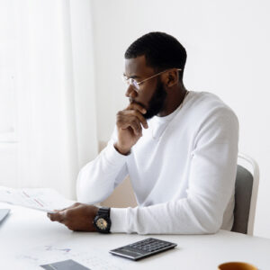 man thinking about why he needs an accountant